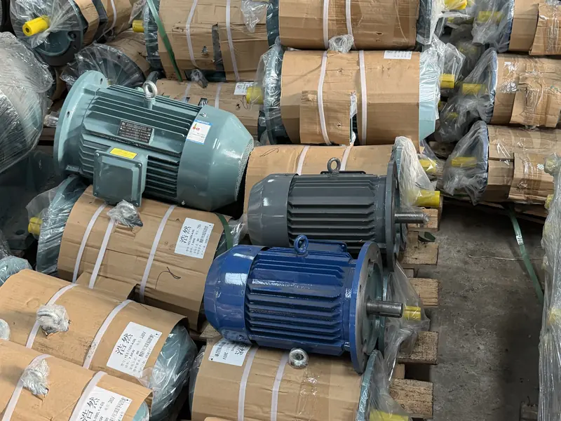 Electric motors and packed units grouped on the workshop floor